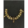 Image 1 : Ornate Vintage Bracelet with Dangling Charms