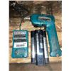 Image 1 : Makita Cordless Driver Drill with 3 Batteries and Charging Stand