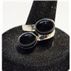 Image 1 : 23)  NATURAL BEZEL SET BLACK ONYX BYPASS RING, STA