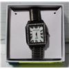 Image 1 : VINTAGE JOAN RIVERS ELASTIC METAL WRIST WATCH,