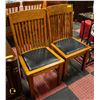 Image 1 : PAIR OF SOLID WOOD FRAMED BLACK CUSHIONED CHAIRS