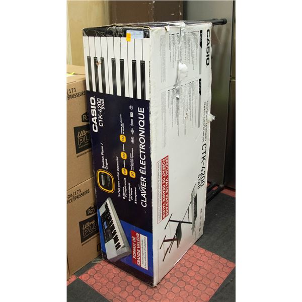 CASIO ELECTRONIC KEYBOARD WITH STAND IN BOX