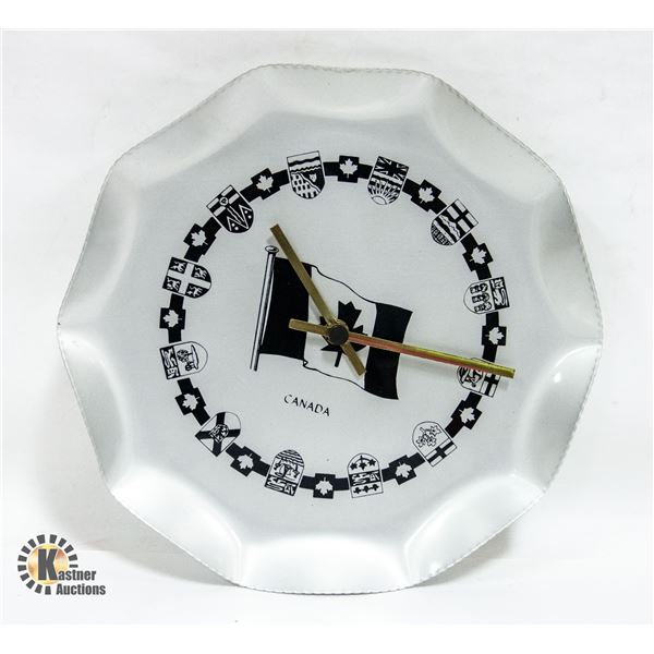 OLD METAL CANADA WALL CLOCK