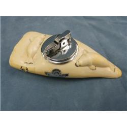 circa 1950 5 3/4 inch whale tooth with 2 seal's made into a lighter, Stock # 814F  By. William Luke 