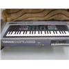 Image 1 : Yamaha electronic key Board and a one of kind wall hanging (230)