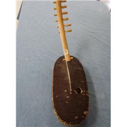 Very unusual animal hide instrument (2)