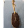 Image 1 : Very unusual animal hide instrument (2)