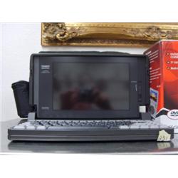 Tandy laptop computer with carrying case, and portable DVD player new in box (266)