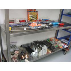 Two shelves of train tracks and train, McKinley explorer train, and Alaska railroad engine (2)