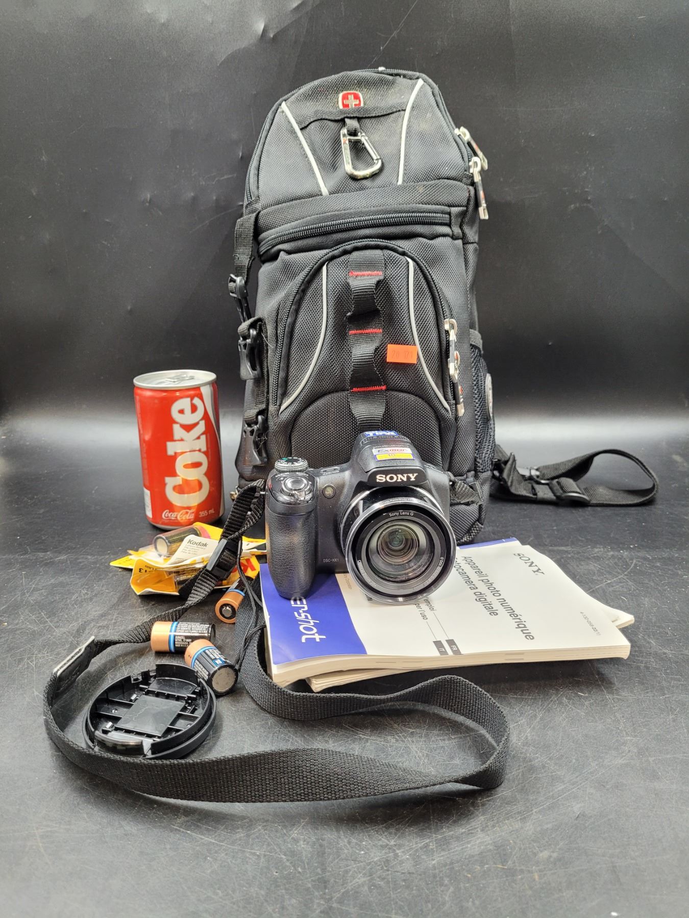 Used Camera Backpack Camera, Backpack, and Battery Lot