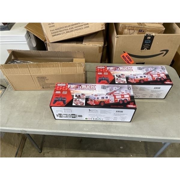 TWO NEW PREXTEX RC FIRETRUCKS WITH  TOY DINOSAUR