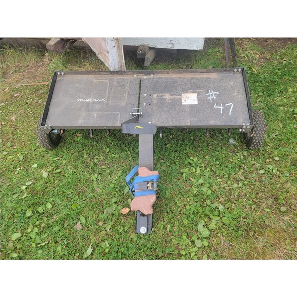 Pull behind lawn aerator