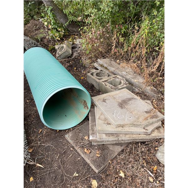 Concrete patio blocks, plastic pipe