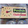 Image 3 : Poulan chainsaw sign, old first aid kit, 24 lb weigh scale & hub caps