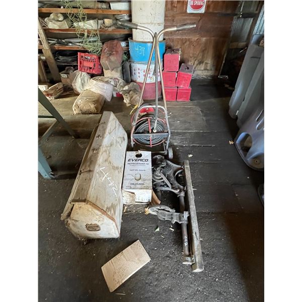 Antique post hole drill, ext. cord on cart