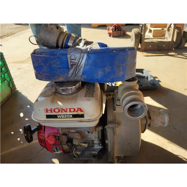 Honda water pump c/w blue hose, running