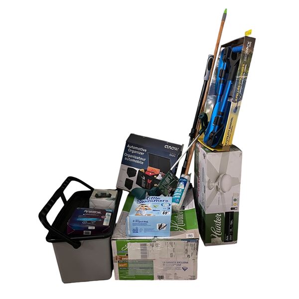 Group of assorted items - automotive organizer/ yacht mop/ Huggie Little Swimmers diapers/ shovels/ 