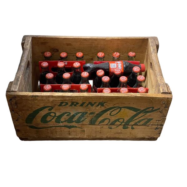 Coca-Cola beverage crate w/ approx 25 Coca-Cola classic 237 ml bottles