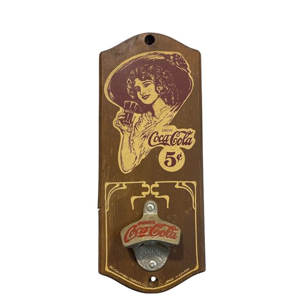 Original Coca Cola Starr X bottle opener on wooden backing
