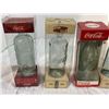 Image 2 : 7 collectible Coca Cola commemorative bottles
