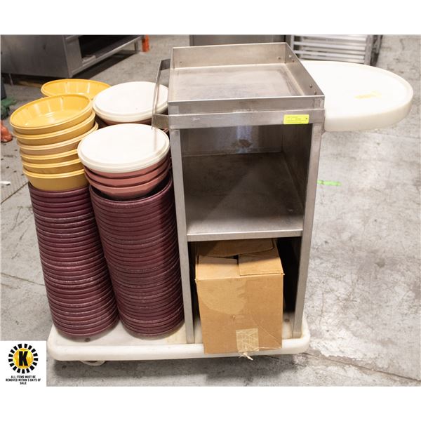 CART WITH TRAY STICKING OUT AND STACKED PLATES