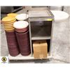 Image 1 : CART WITH TRAY STICKING OUT AND STACKED PLATES