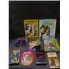 Image 1 : Lot of Assorted Comic Related Ultimate C-Men Hardcover, Curious George Paper Dolls, Dick Tracy, Etc