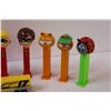 Image 2 : (9) PEZ: Incredibles, Garfield, Ladybug, Football , Santa, Nascar Semi