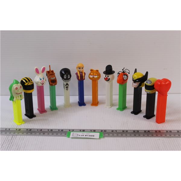 (12) PEZ: Garfield, Frozen, Snowman, Wolverine, Nascar, Misc.