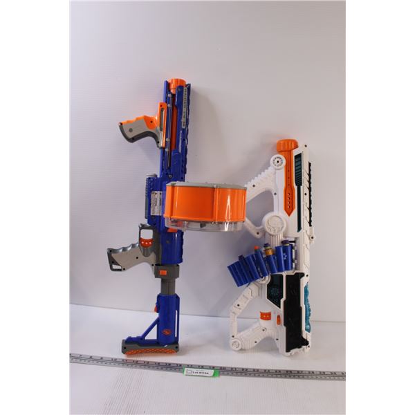 (2) Nerf Guns (Blue One Works & White One May Be Jammed?)
