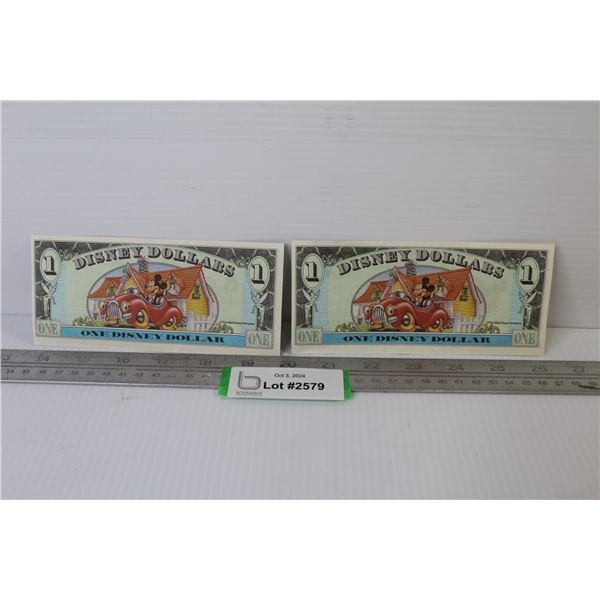 ^(2) Disney Dollars