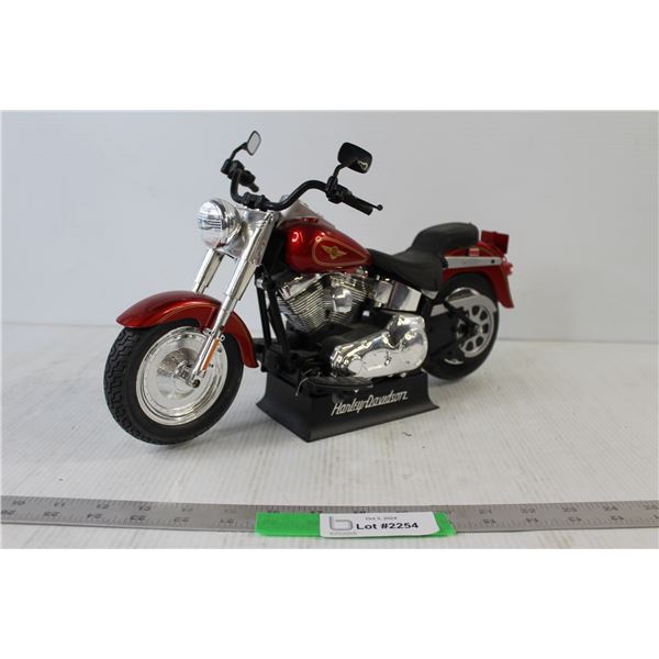 Red Harley Davidson Model Bike on Stand
