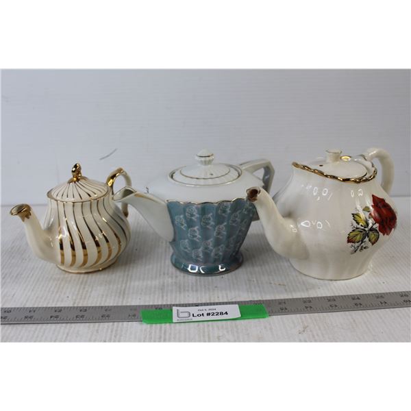(3) Teapots