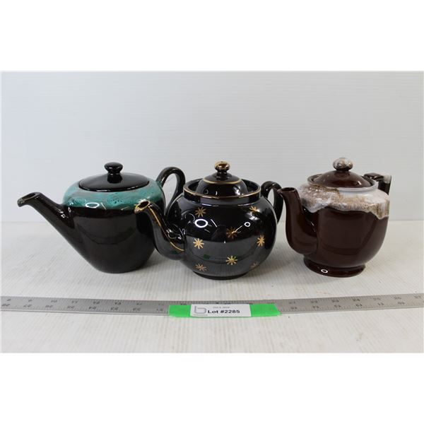 (3) Teapots