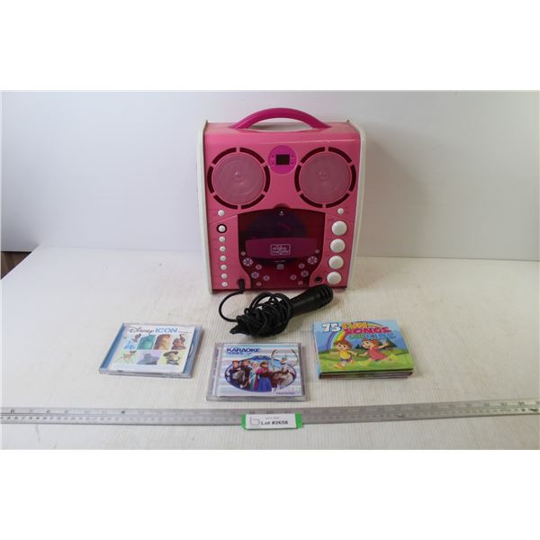 The Singing Machine w/Microphone & Karaoke CDs (as is - needs batteries)