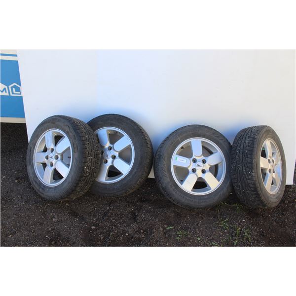 ** (4) Nokian Set of Winter Tires - 195-65R15 - Some Wear - On Pontiac Four Bolt Rims