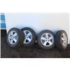 Image 1 : ** (4) Nokian Set of Winter Tires - 195-65R15 - Some Wear - On Pontiac Four Bolt Rims