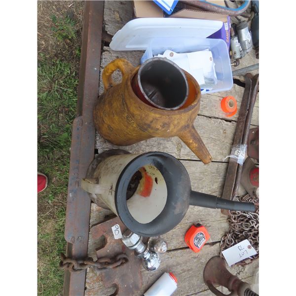 2 oil jugs and 1 funnel