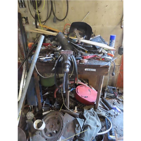shop table with leg vice and assorted hardware, steel, etc.