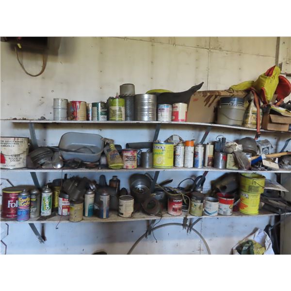 3 shelves of assorted paints and hardware
