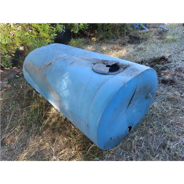 water tank - has damage on one side, would make good rain barrel