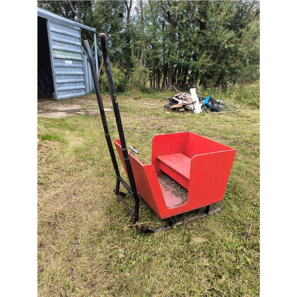 red wooden sleigh