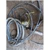 Image 1 : assorted hoses, sump pump, and shallow well pump (untested)