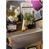 Image 1 : Lotion thermometer, books, paper towel holder