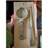Letter opener and magnifying glass