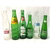 Image 2 : 6 Assorted Vintage Glass Soda Bottles: 7Up, Alert, Squirt, Stubby, & Fanta