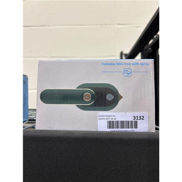 Mini portable and folding clothing iron with spray function
