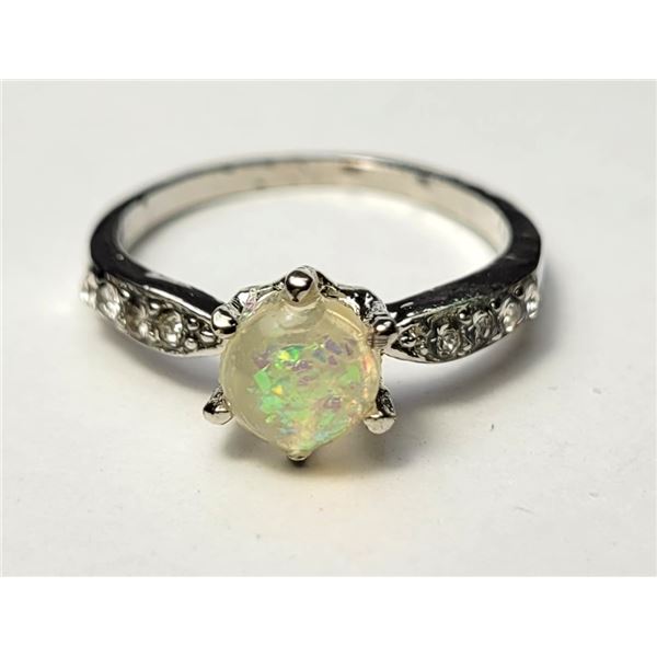 23)  SILVER TONE W/CLEAR CZ & CREATED WHITE FIRE