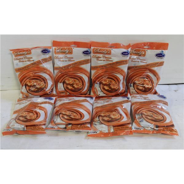 EIGHT PACKAGES OF SWIRLY’S BUTTERCREAM CANDY