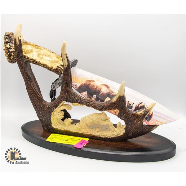 DECORATIVE HUNTING KNIFE ON A STAND, FROM